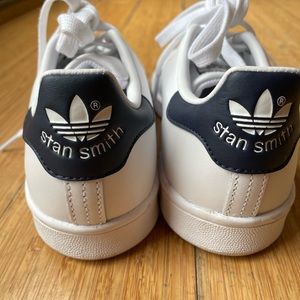 Adidas Stan Smiths. Worn one time.  Run large.